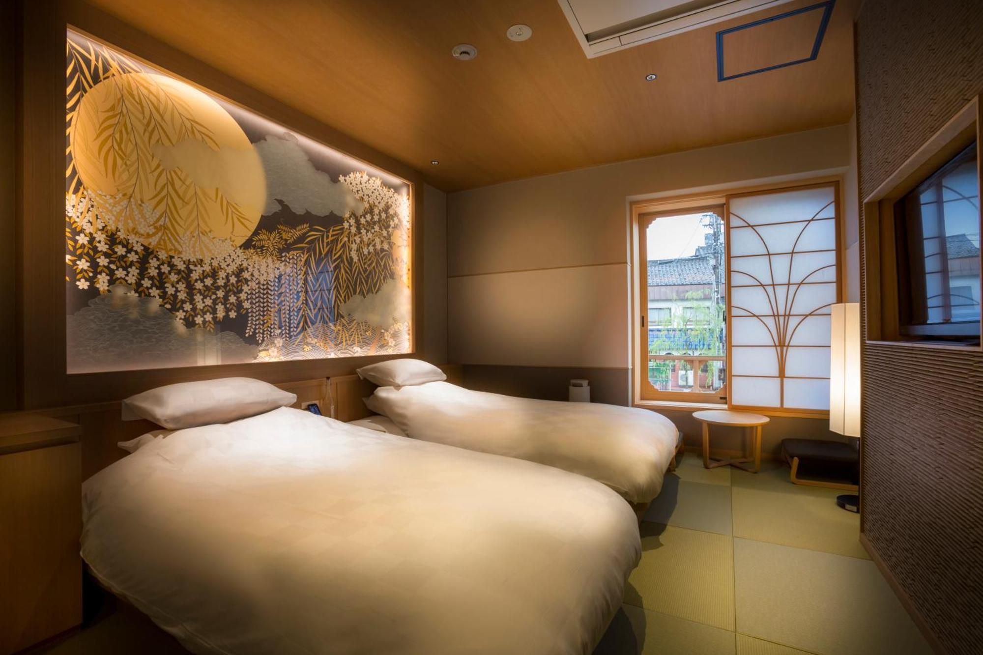 מלון טויוקה Kinosaki Onsen Tokitotoki חדר תמונה